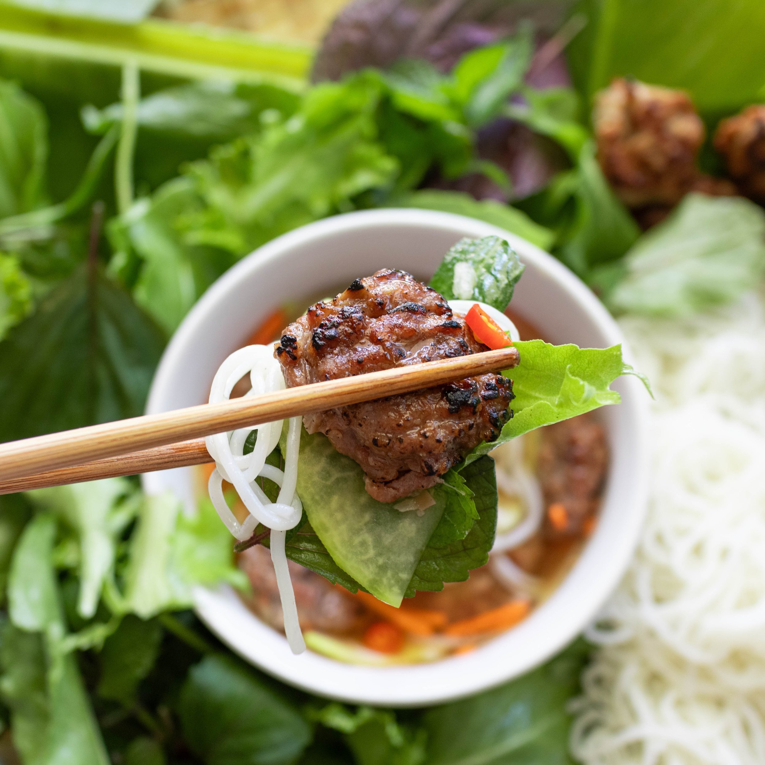 The allure of Bun Cha Hanoi lies in its three meticulously prepared main components. First, there ar...