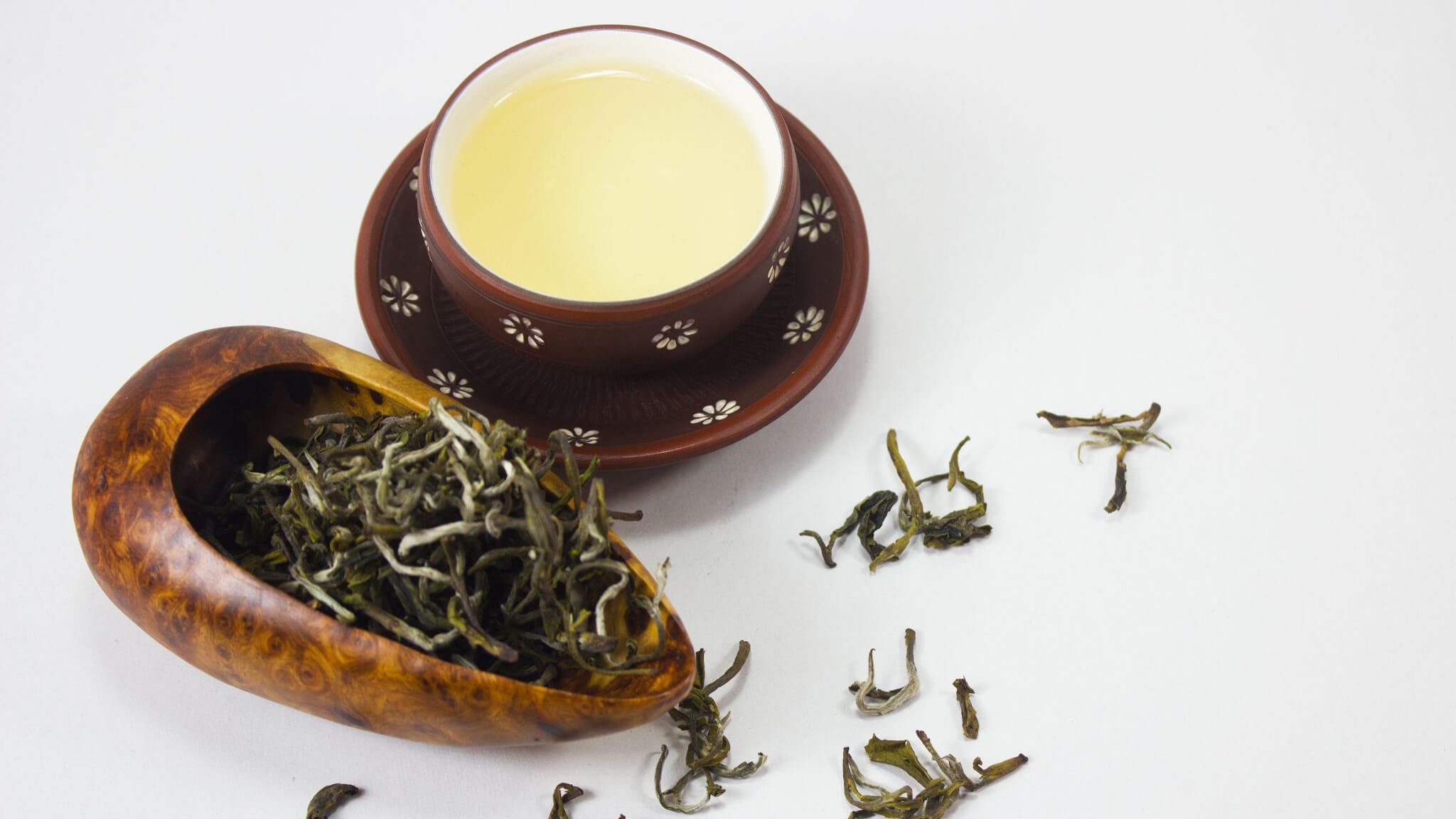 After steeping, a cup of Ha Giang Shan Tuyet Tea reveals a rich golden color, like forest honey, per...