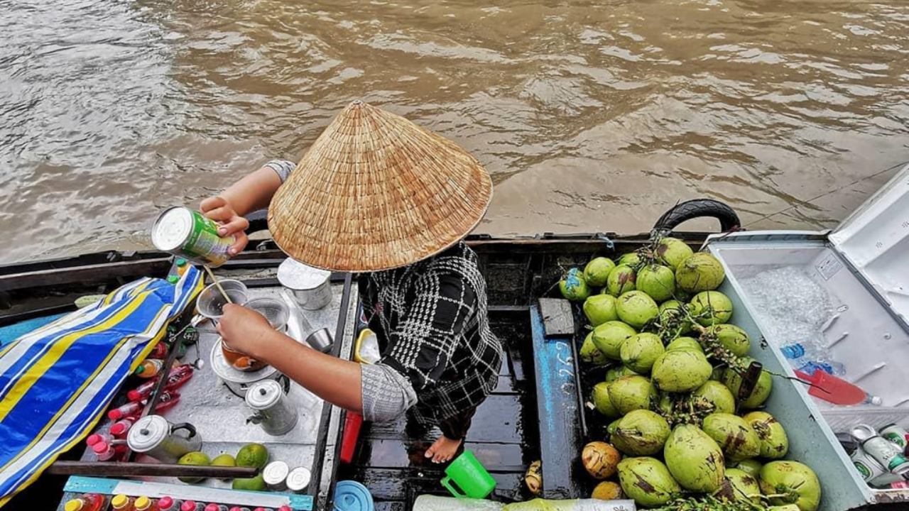 An unmissable experience when visiting Cai Be Floating Market is sipping a cup of coffee or iced tea...
