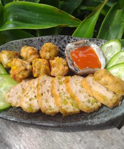 Beyond sweet treats, Com also finds its way into savory dishes, most notably Chả Cốm (Com pork patti...