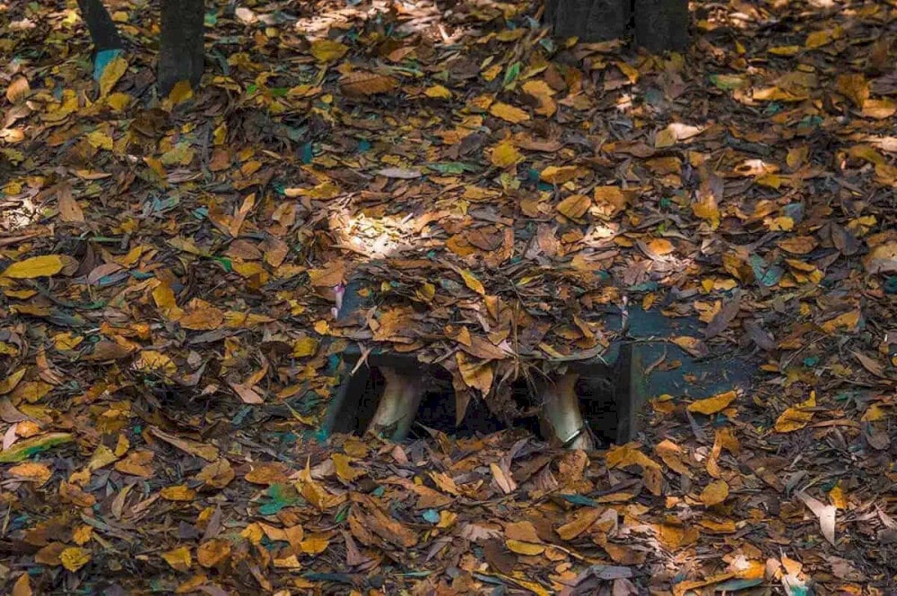 The ingenuity of guerrilla warfare is further showcased through the cleverly camouflaged tunnel entr...