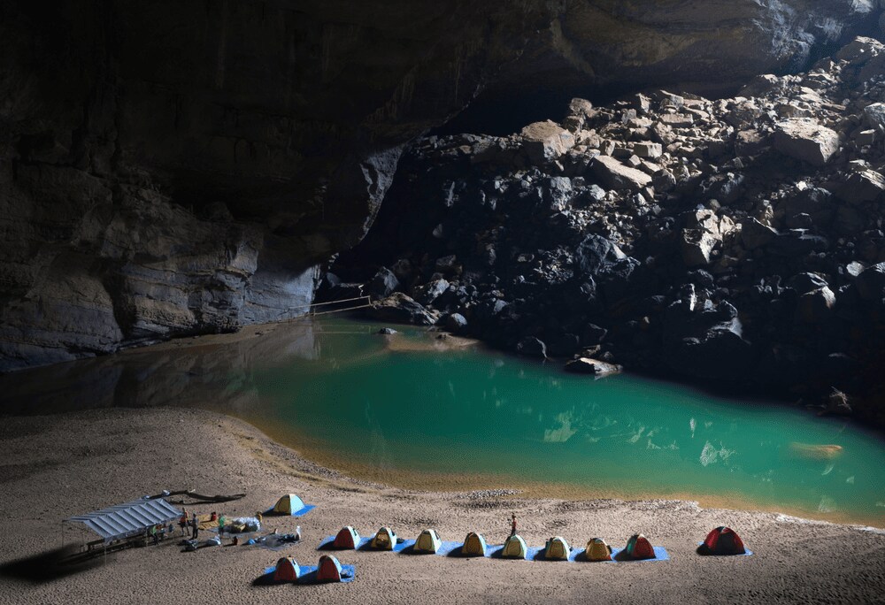 Imagine pitching your tent within the world's largest cave, especially near one of its majestic skyl...