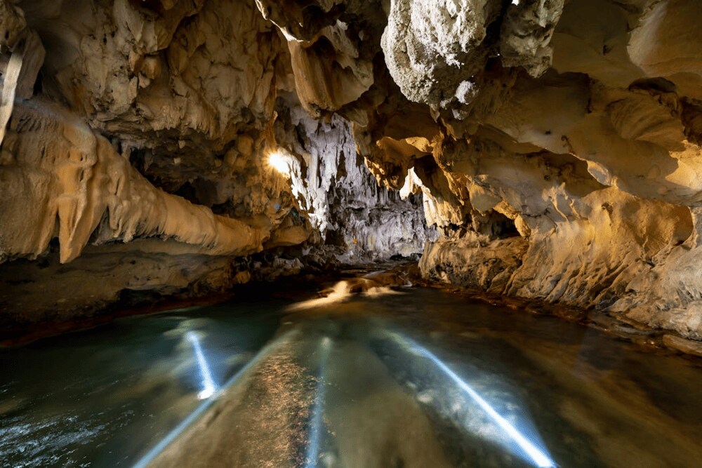 Beneath the colossal chambers, a mysterious underground river, fed by countless subterranean sources...