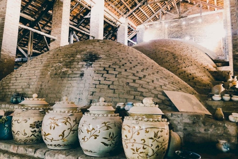 To delve deeper into the history and techniques of pottery making, visit the ancient Gourd Kiln (Lò ...