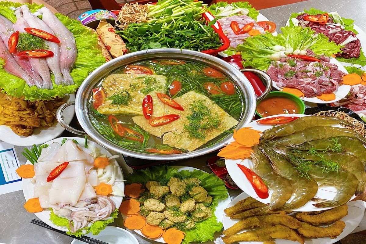 The broth is gently simmered with ripe tomatoes, sweet pineapple, fresh bamboo shoots and aromatic h...