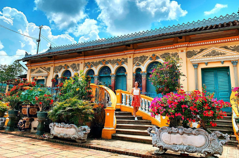 Beyond its architecture and antiques, Binh Thuy Ancient House is also renowned for its precious orch...