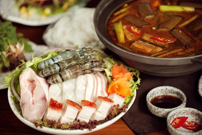 Lau Mam (fermented fish hotpot) in Can Tho is an unmissable specialty, standing out with its rich fe...