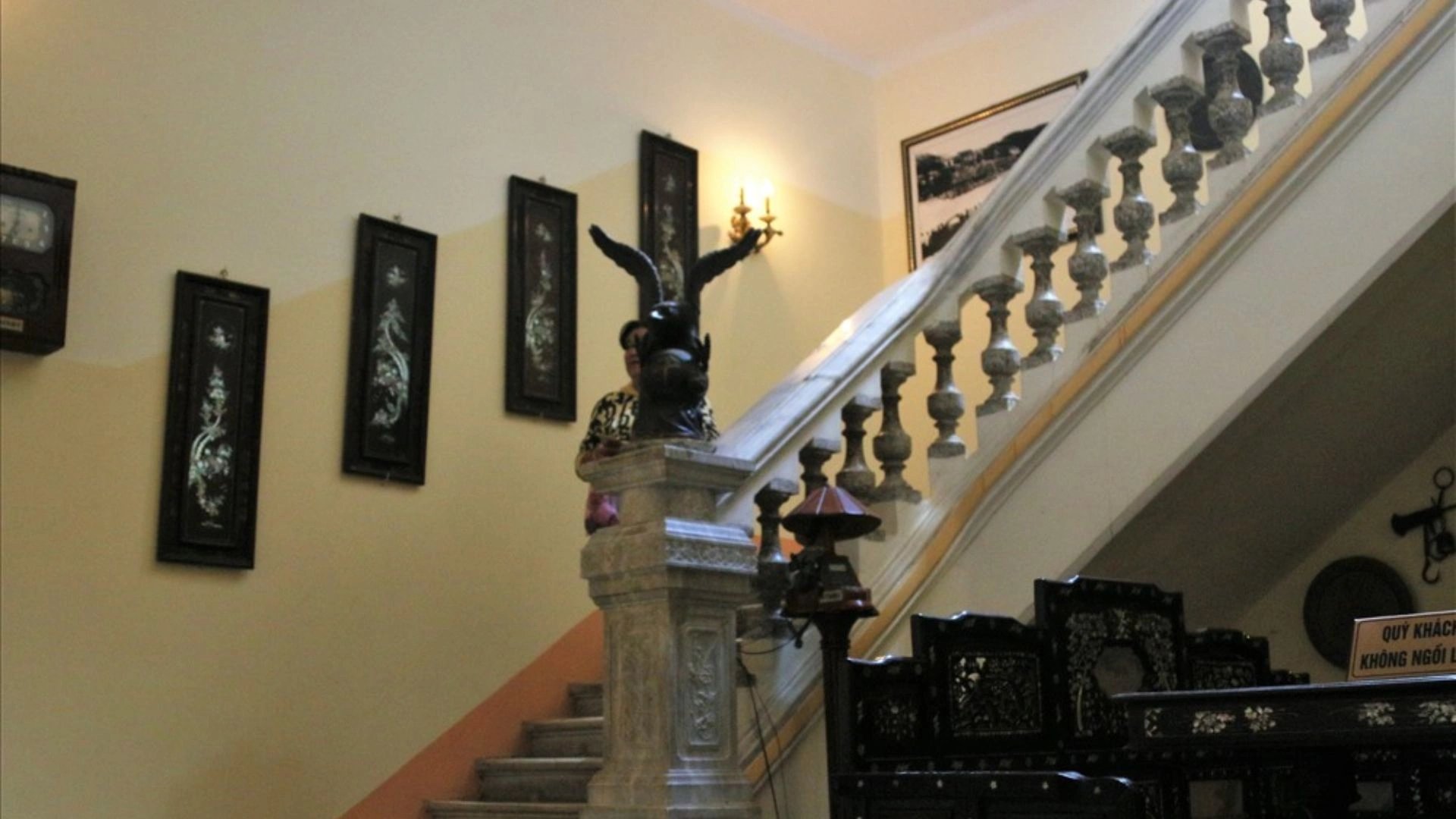 The staircase inside the house is crafted from white marble, consisting of three sections, each with...