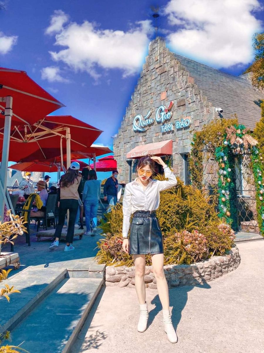 Quan Gio Cafe (Quán Gió Tam Đảo), an architectural masterpiece, perches precariously on a cliff, off...